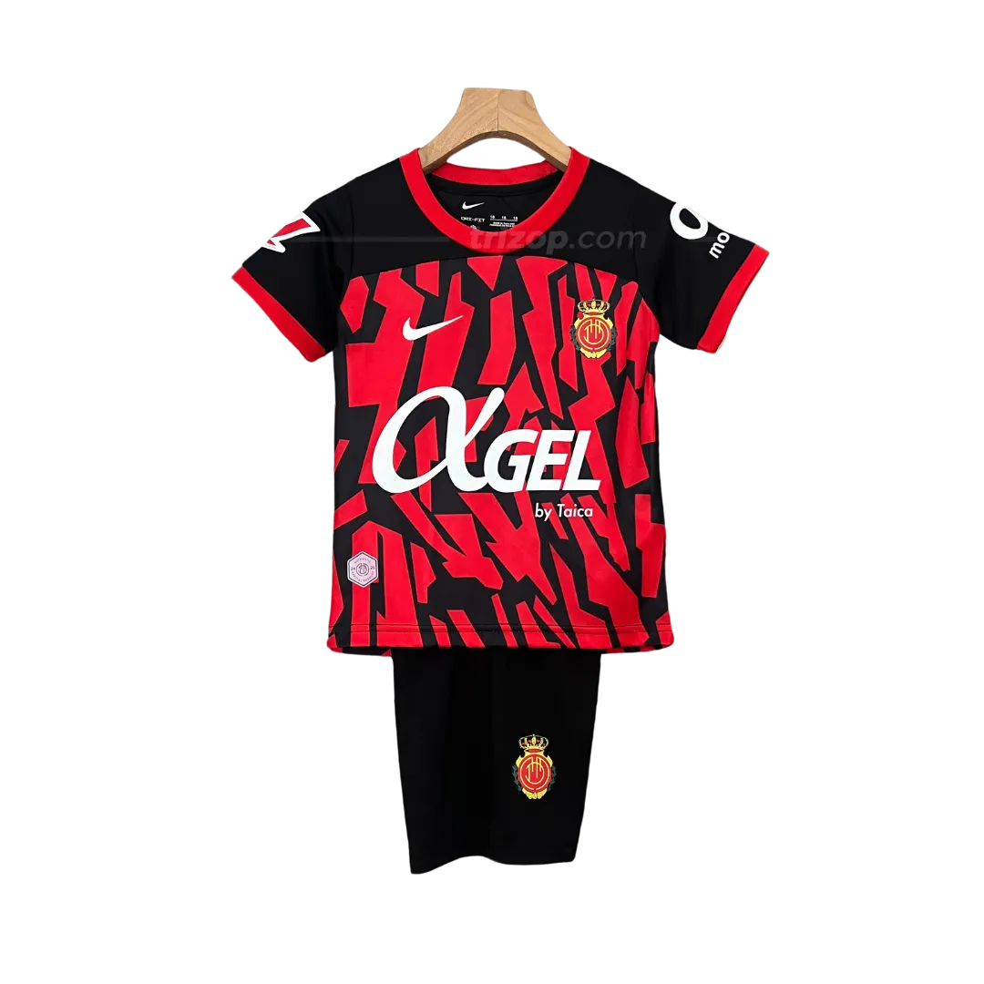 mallorca-casa-24-25-kit-nino-1 Conjunto niño primera Mallorca 24/25 - Imagen 1